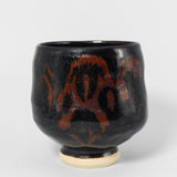 Tea-bowl in Flame by Jugglers Cove Pottery