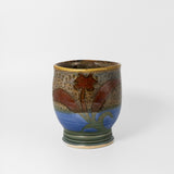 Tea-bowl in Flo Blue/Partridge by Jugglers Cove Pottery