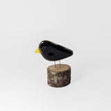 Blackbird On Perch by The Glass Bakery