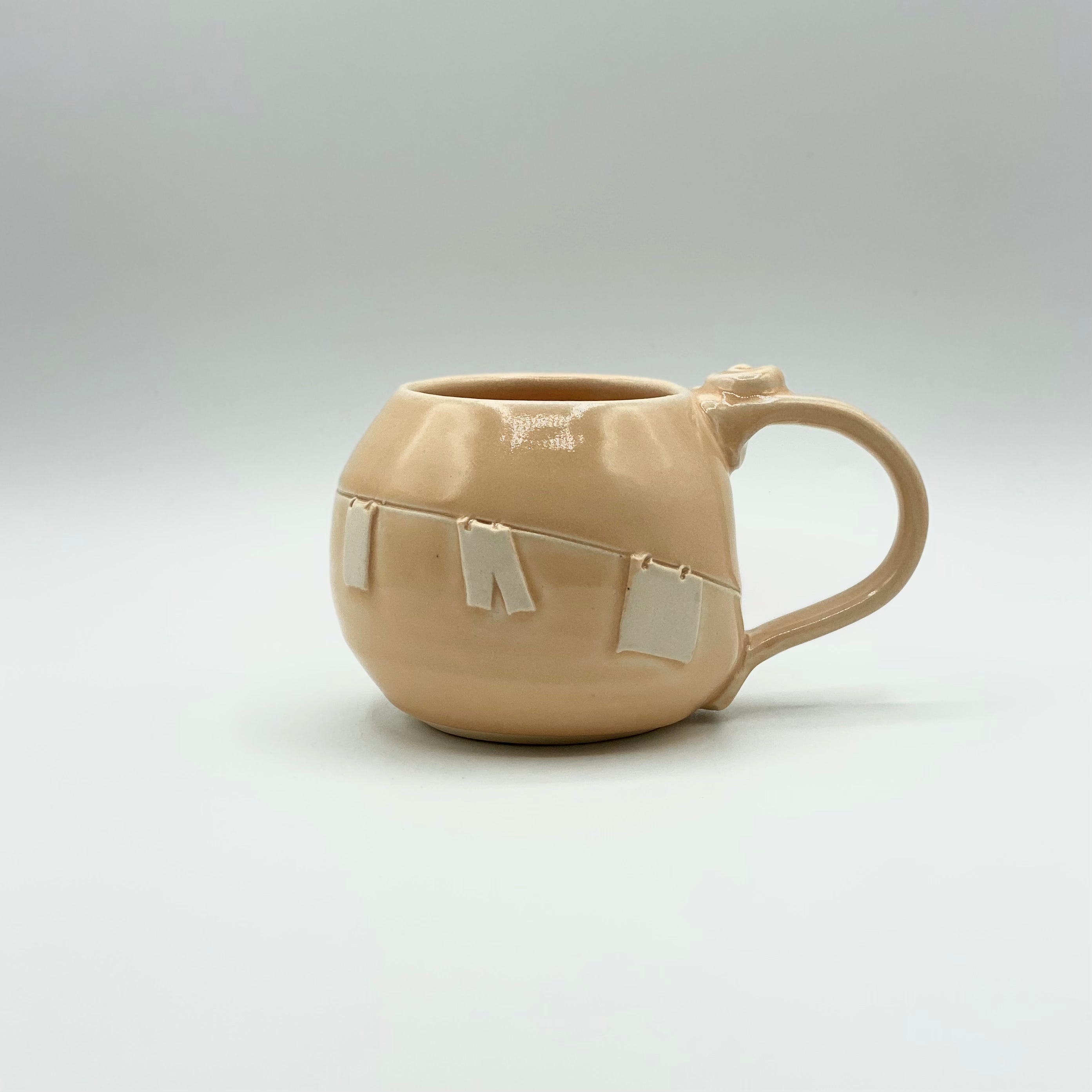 Clothesline Mug by Poterie Ginette Arsenault