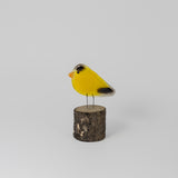 American Goldfinch on Perch by The Glass Bakery