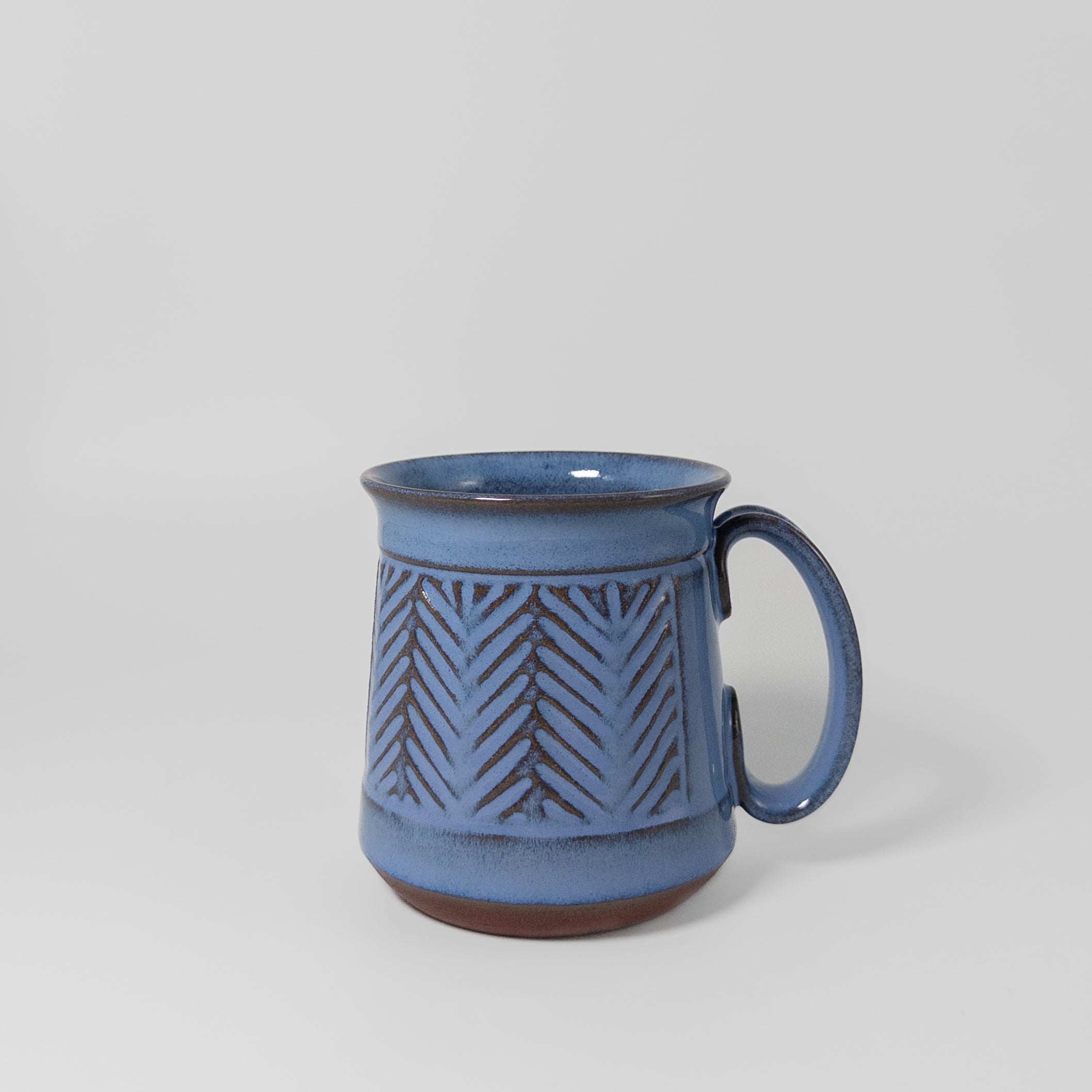 Mug in Saffire by Gena Denning Pottery
